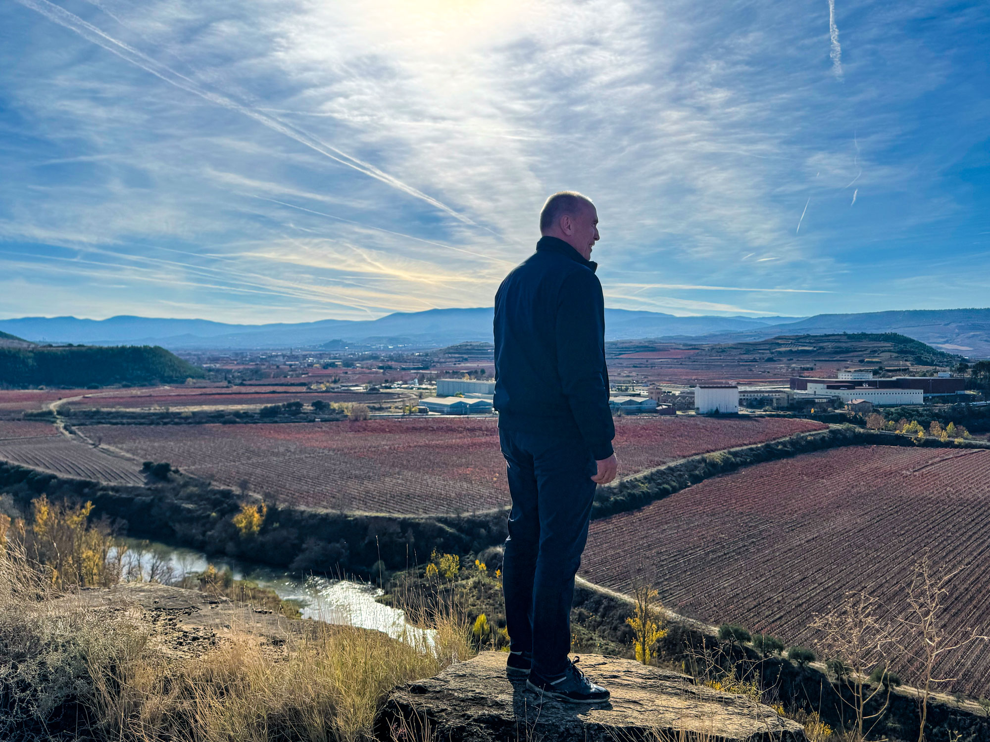 Founder Brian Thompson overlooking Rioja vineyard landscape near Logroño, illustrating the CLOS CIEN vineyard ownership model in northern Spain.